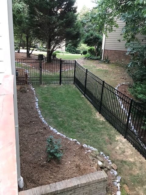 Aluminum Flat Top With Puppy Guard 1 fence installed by Shelby Fence Company in Alabaster, AL