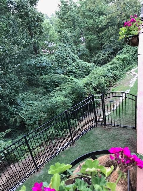 Aluminum Flat Top With Puppy Guard 3 fence installed by Shelby Fence Company in Alabaster, AL