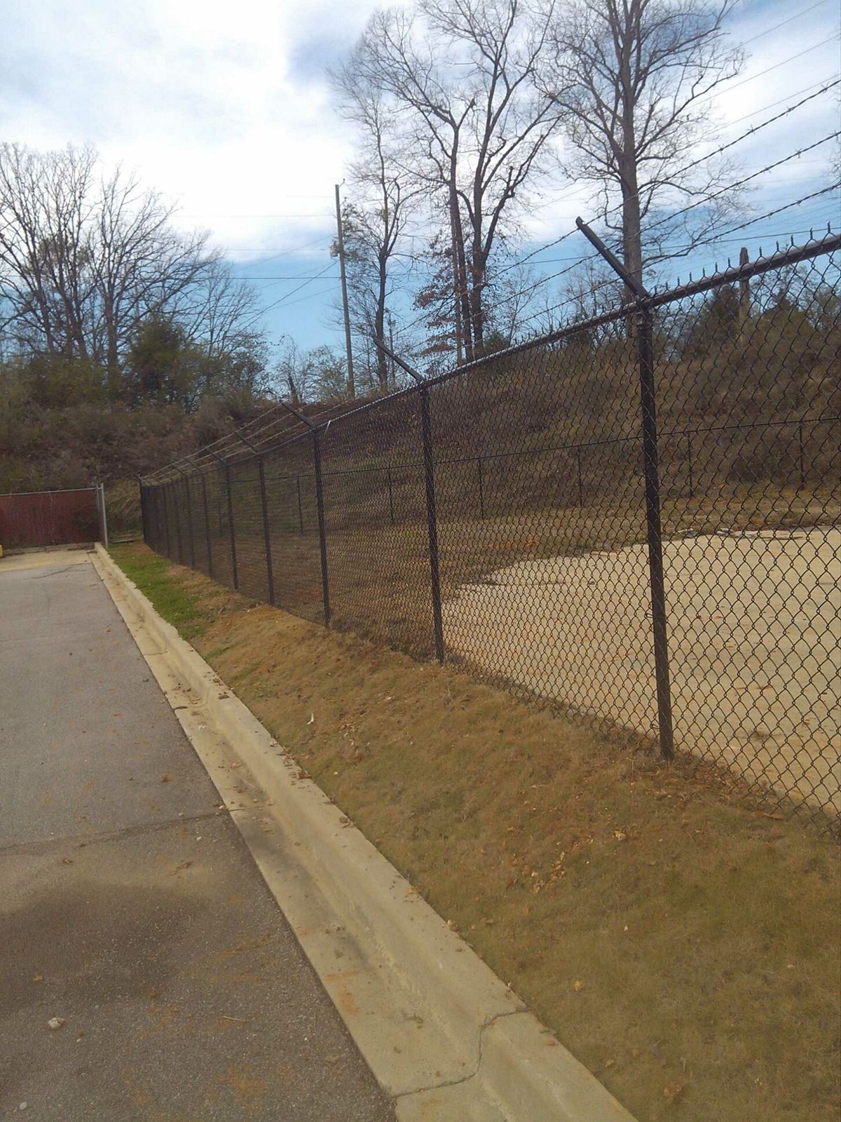 Chain Link With Bobwire fence installed by Shelby Fence Company in Alabaster, AL