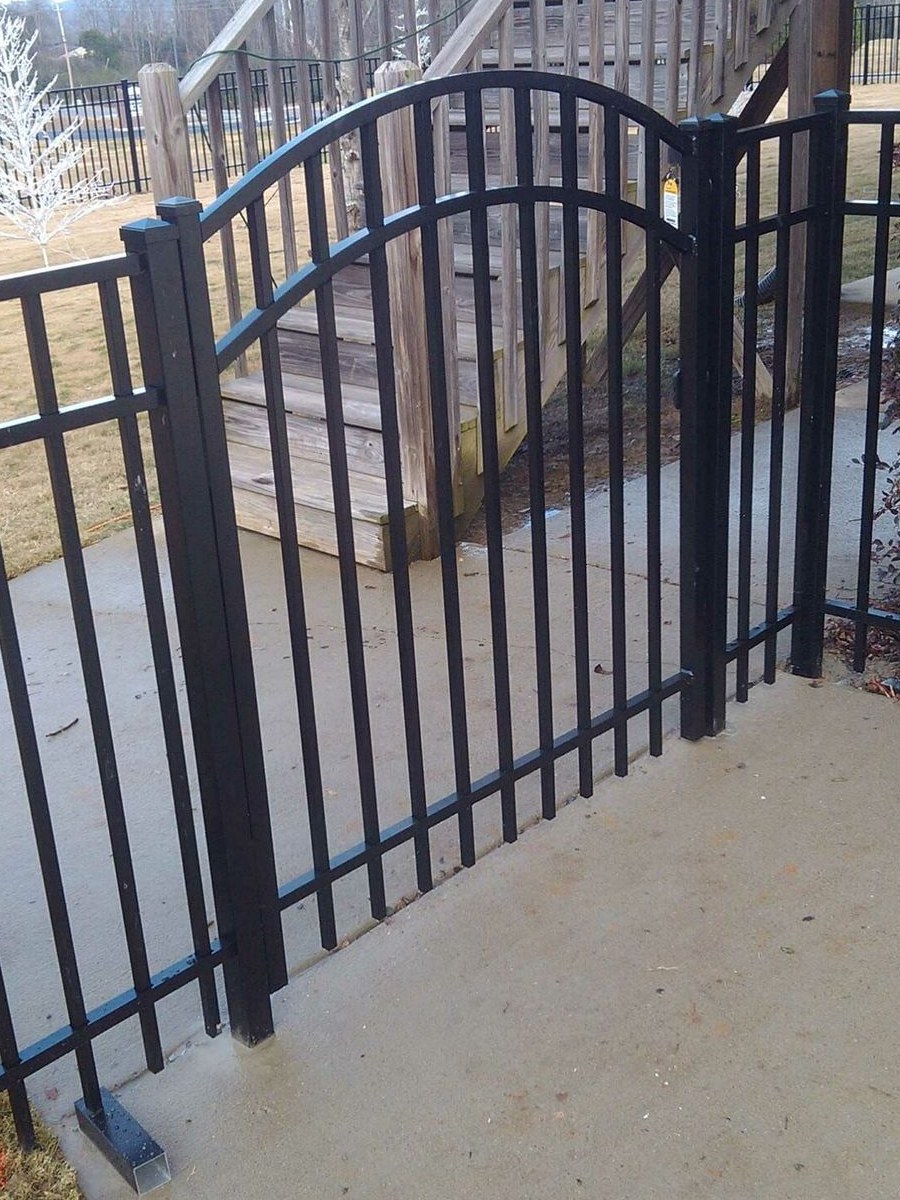 Aluminum flat-top fence with arched gate in Alabaster, AL